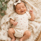 Bloom Whisper Organic Onesie